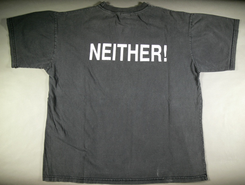 A faded black tshirt with the word 'NEITHER!' printed on the front.