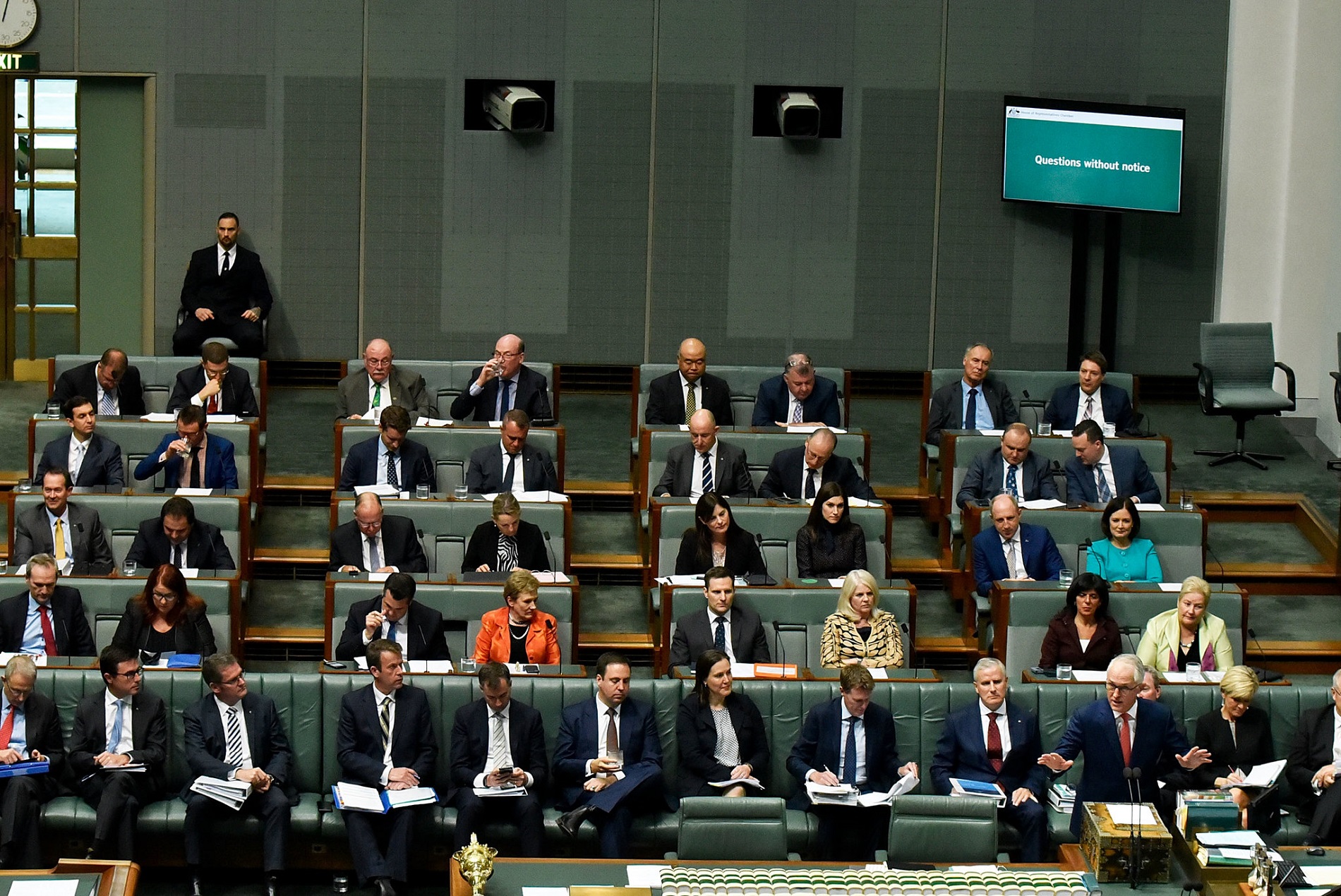 Prime minister Malcolm Turnbull standing and addressing parliament during question time in the House of Representatives.