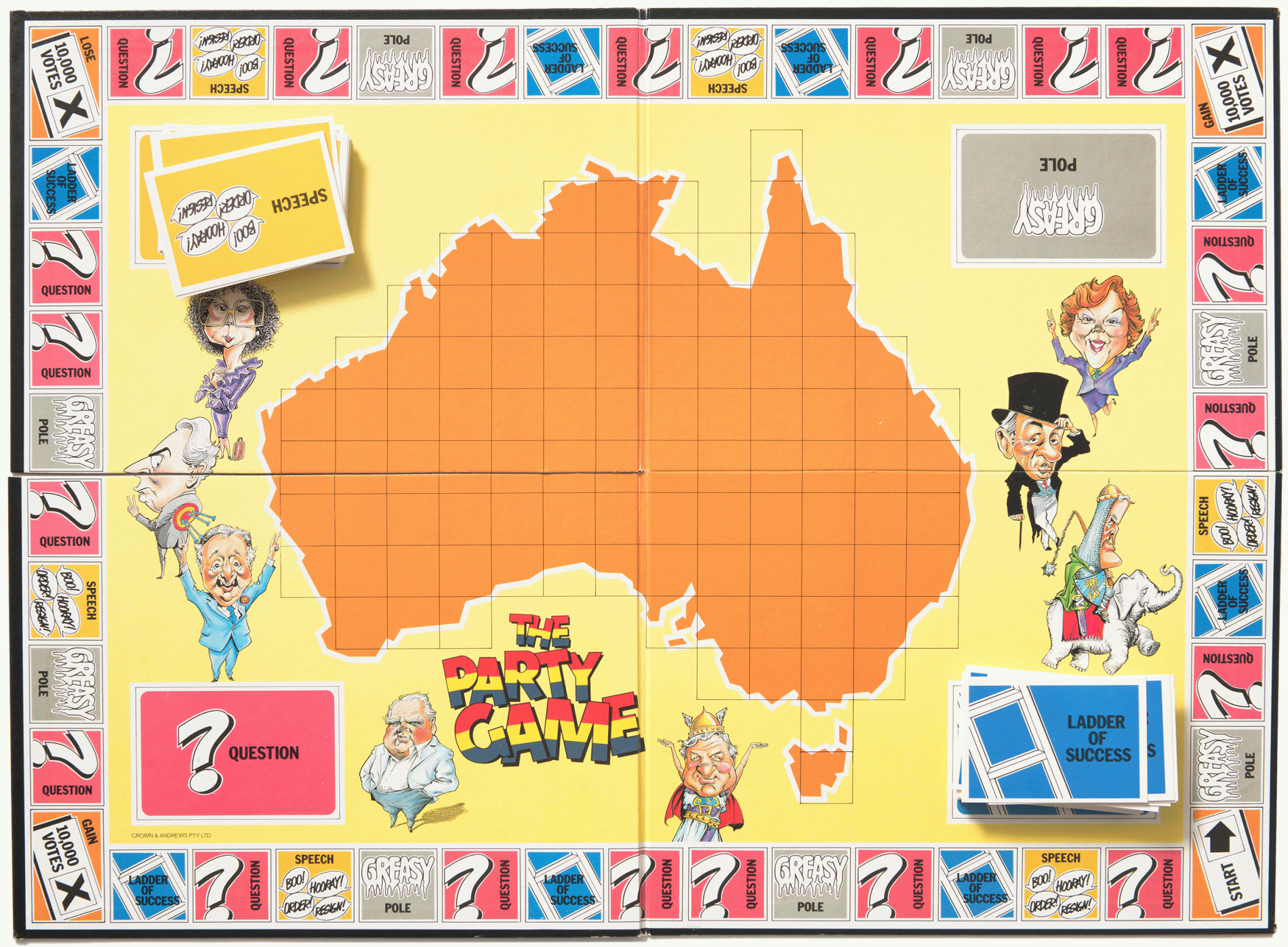 A yellow board game board is open with a map of Australia in the middle and the words The Party Games with red, yellow and blue lettering. Caricatures of politicians feature n the board. Squares along the border have words like Question, Ladder of success, Greasy pole and speech on them. 