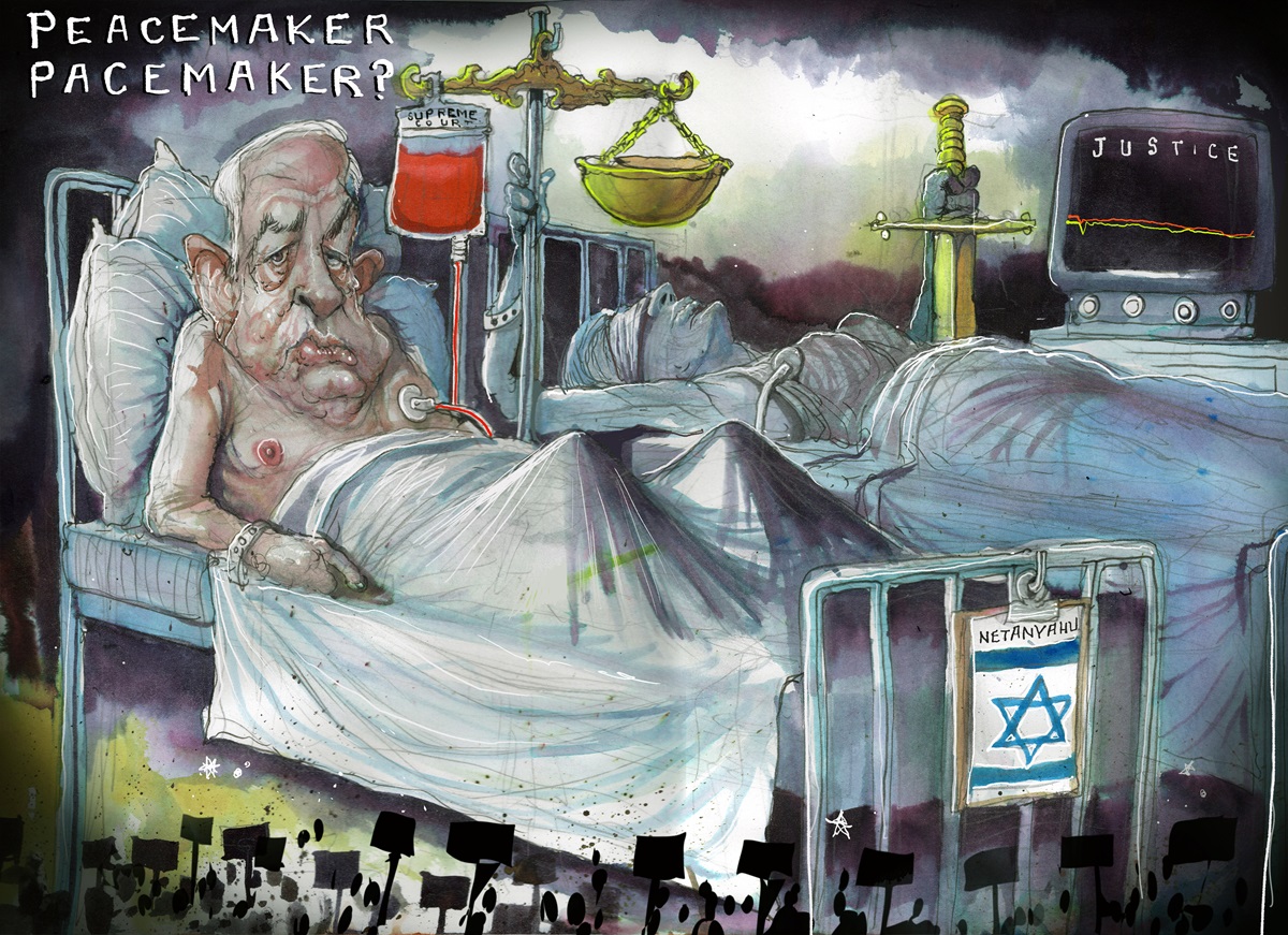 A frail Benjamin Netanyahu sits in a hospital bed with his chest hooked up to a red IV. In the next bed lies a lady called 'Justice' whose heart monitor shows a flat line. Text reads: 'Peacemaker pacemaker?'