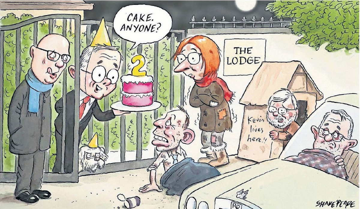 Prime Minister Anthony Albanese leans out of a high gate to offer a celebratory '2-years' cake to a hungry and unhoused group of politicians – Peter Dutton, Tony Abbott, Julia Gillard, Kevin Rudd and Scott Morrison. 