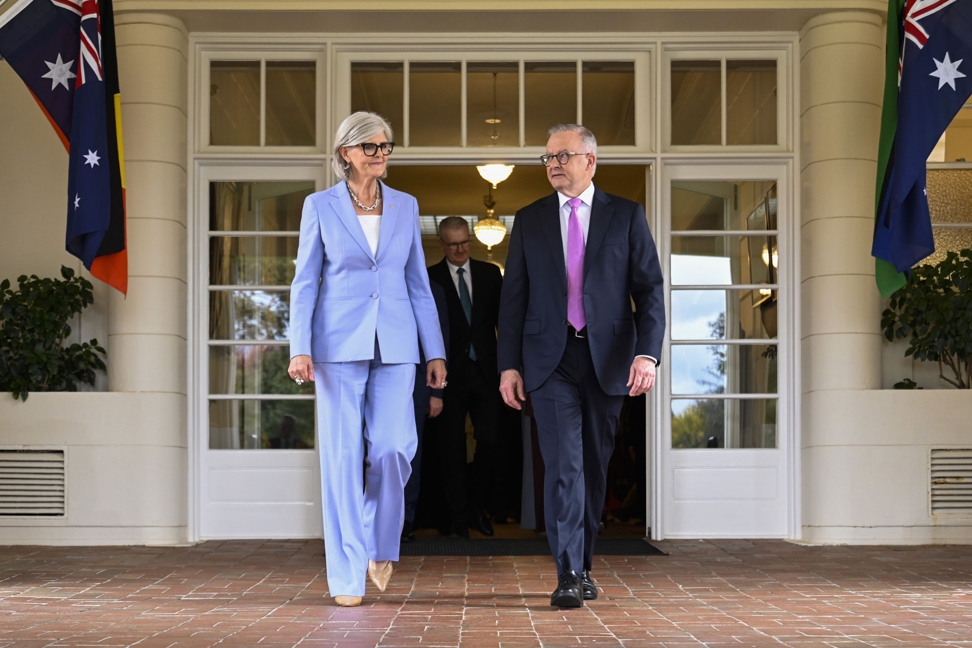 Governor-General Sam Mostyn and Prime Minister Anthony Albanese walk outside Government House in Canberra. Governor-General Sam Mostyn and Prime Minister Anthony Albanese walk outside Government House in Canberra.