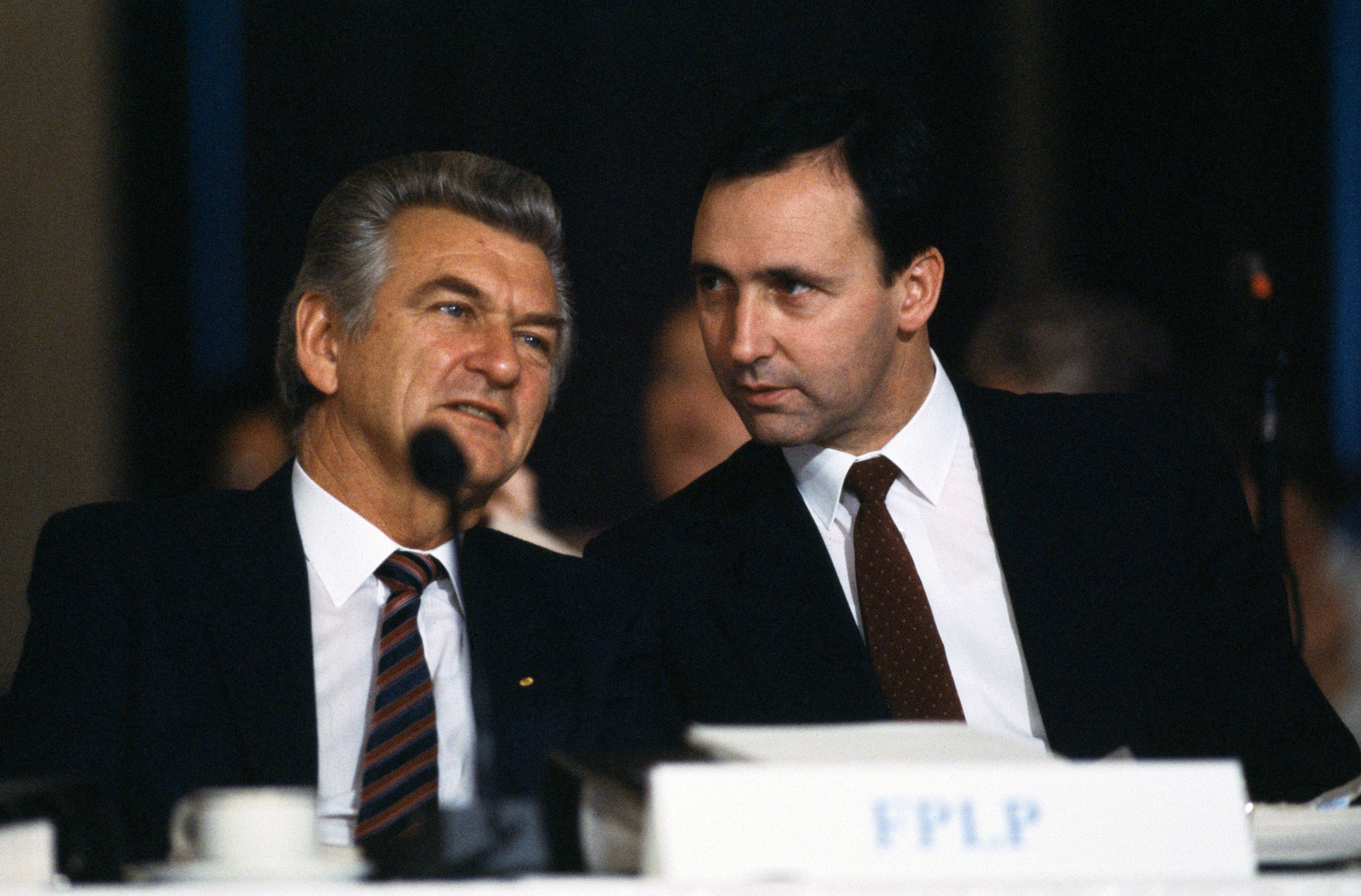 Prime Minister Bob Hawke and (future prime minister) Paul Keating sit behind a microphone at an Australian Labor Party conference. Prime Minister Bob Hawke and (future prime minister) Paul Keating sit behind a microphone at an Australian Labor Party conference.