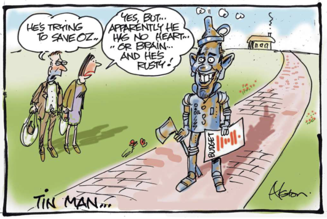 Treasurer Jim Chalmers dressed as the Tin Man from the Wizard of Oz holds the budget. One person says, 'He's trying to save Oz.' Another says, 'Yes, but apparently he has no heart… or brain… and he's rusty!' 