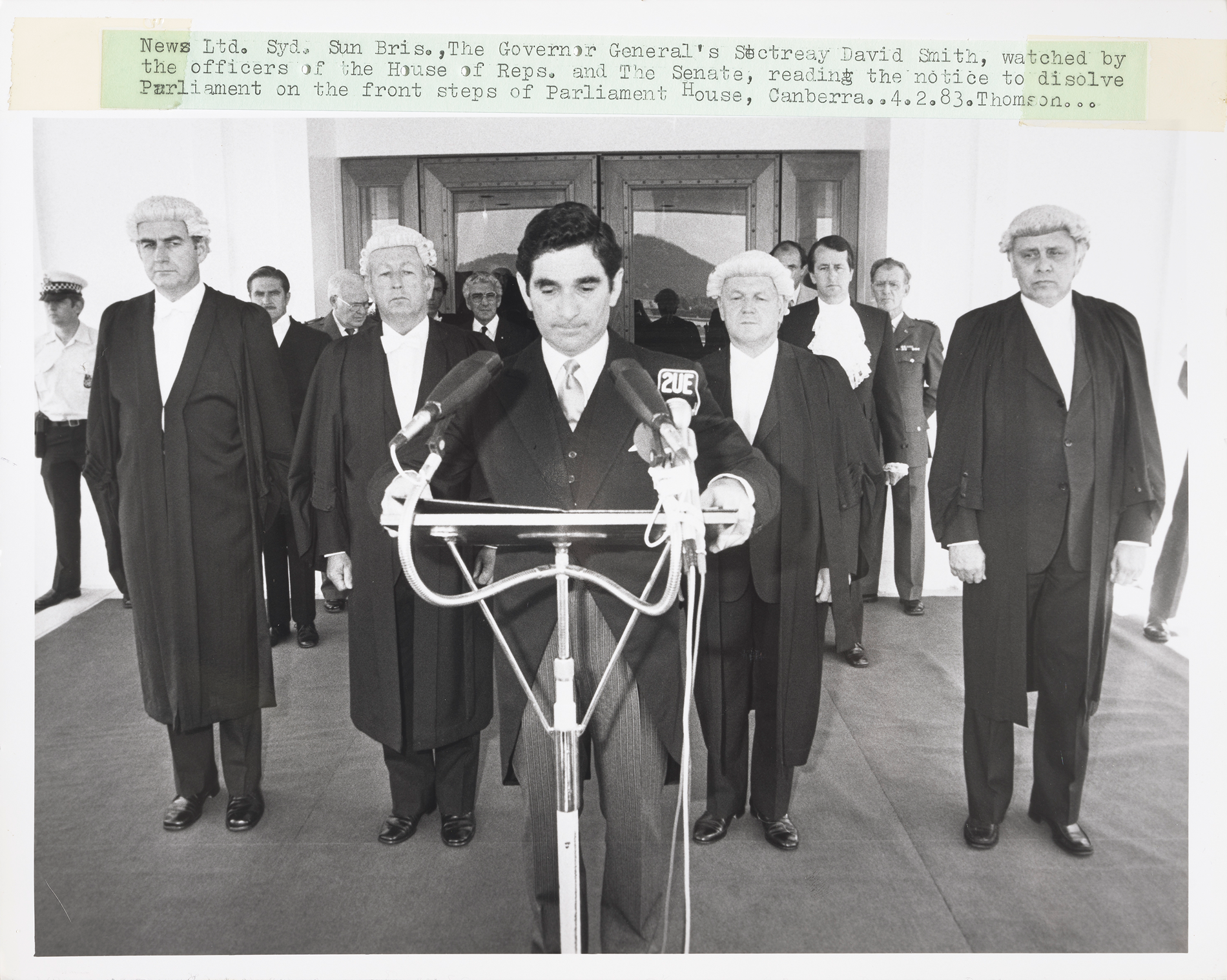 The Governor General's Secretary, David Smith, reading a proclamation to dissolve parliament on the front steps of Parliament House, 1983