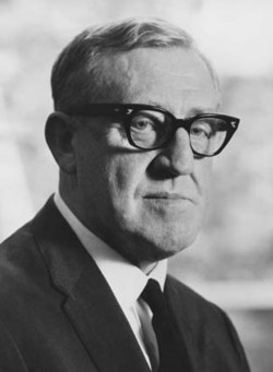 A scan of a black and white portrait photograph showing former politician Arthur Calwell