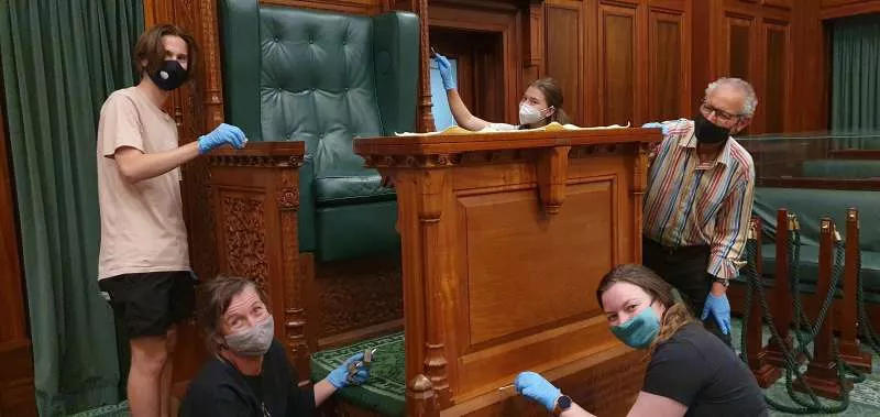 MoAD staff and conservators carefully clean the Speaker’s Chair in the House of Representatives. MoAD staff and conservators carefully clean the Speaker’s Chair in the House of Representatives.