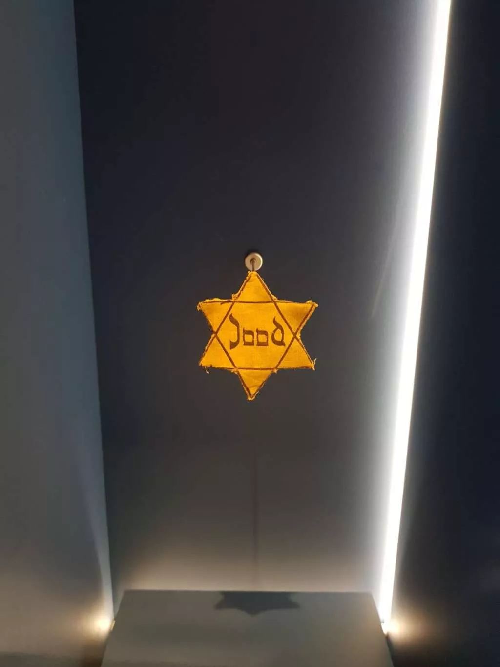 A cloth patch of the Star of David, worn by Dutchwoman Jeanette ('Netty') Gerritse in the 1940s during the Holocaust. 
