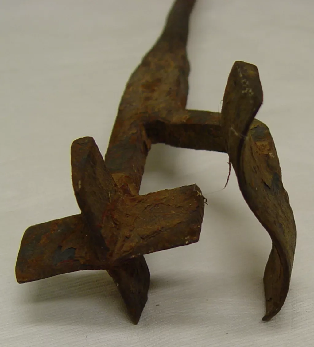 An old rusted branding iron.