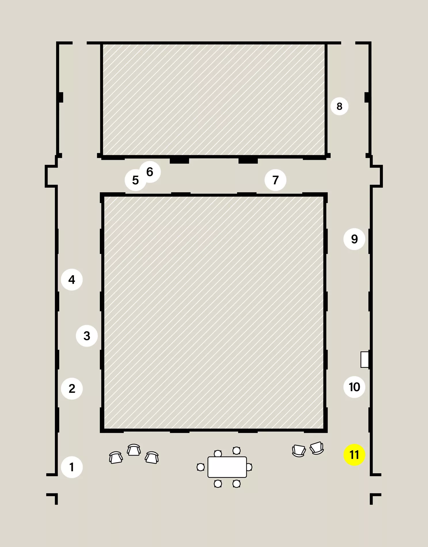 Map of a capital H-shaped exhibition space. Eleven numbered white circles show the location of stops on the audio tour. Stop 11 is highlighted yellow.