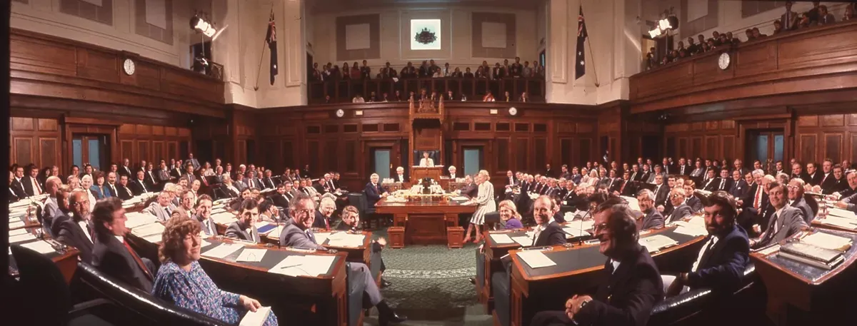 Men and women politicians sit in the green House of Representatives chambers in Old Parliament House in 1988.