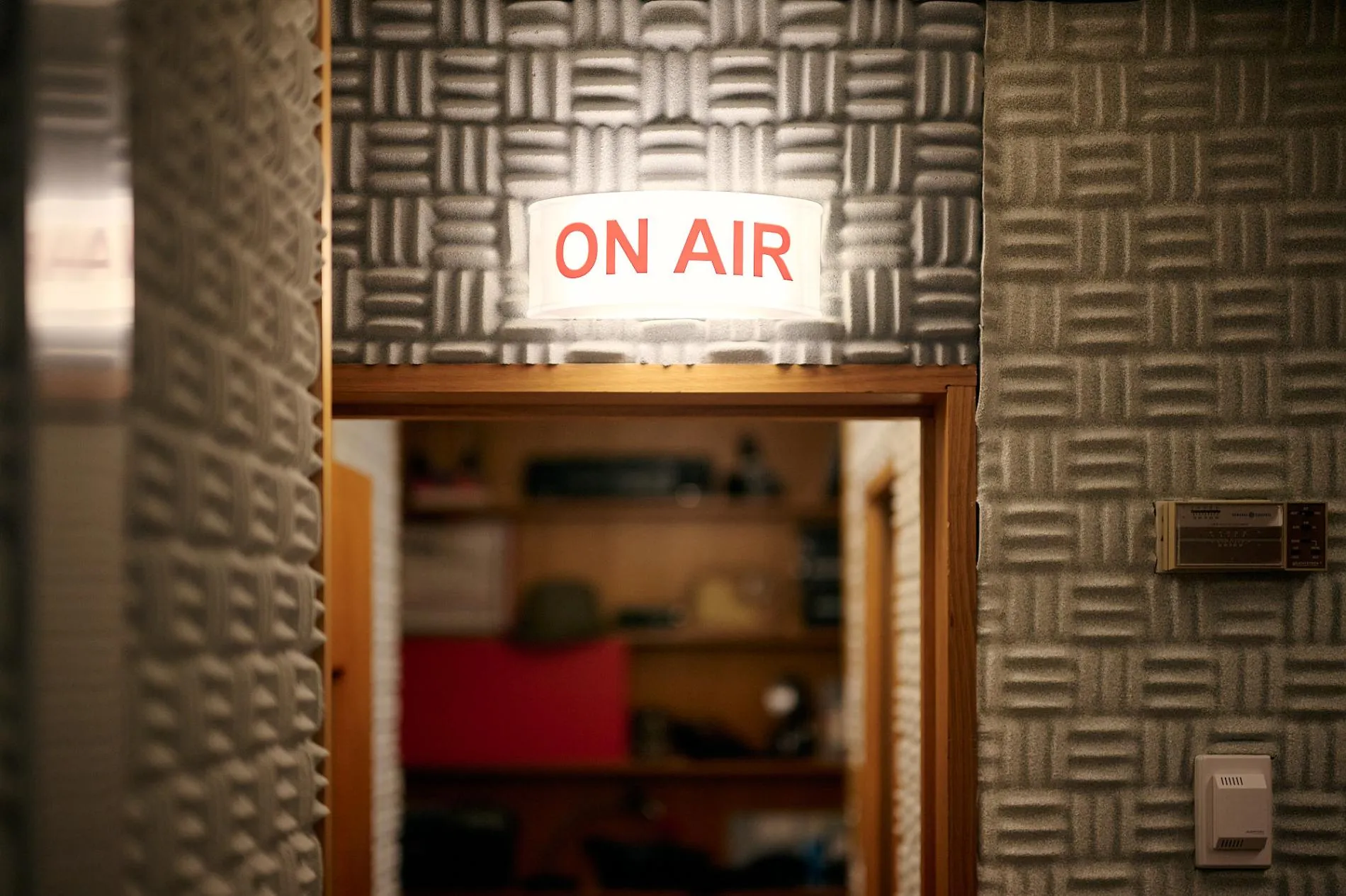 An 'on air' sign is lit up in a studio in the Press Gallery in Old Parliament House.