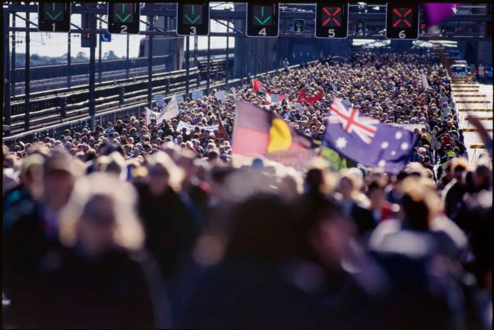 A huge crowd of people walk across Sydney Harbour Bridge as part of the walk for reconciliation in 2000.
