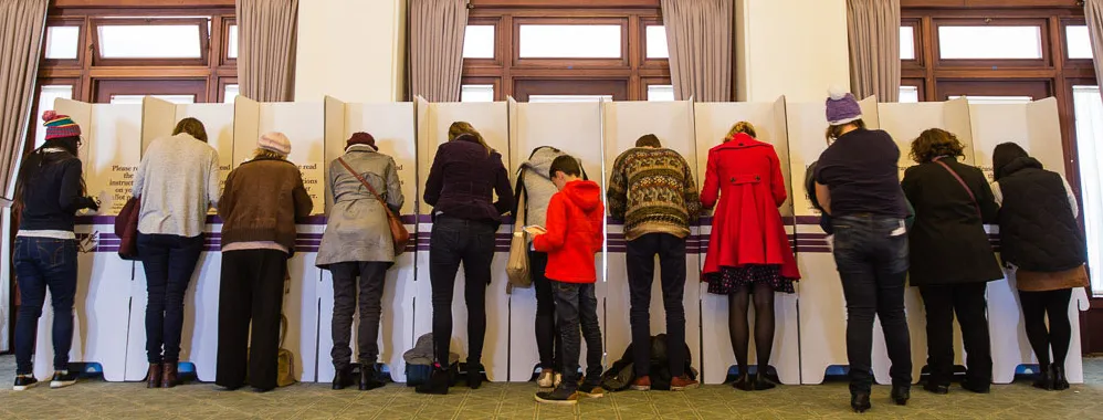 People vote in cardboard booths at Old Parliament House.