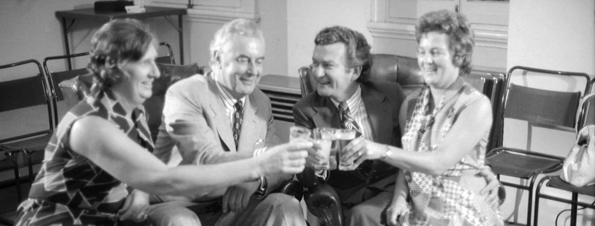 Gough and Margaret Whitlam clink their glasses with Bob and Hazel Hawke.