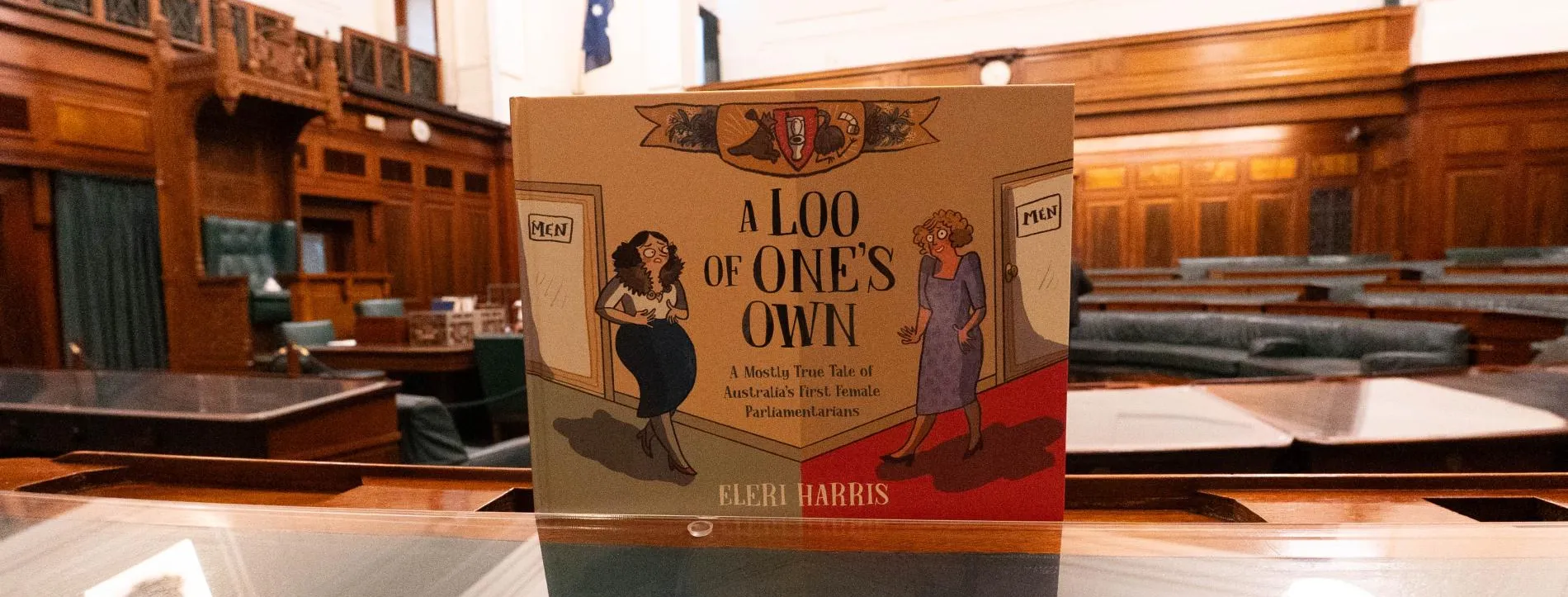 A Loo of One's Own book by Eleri Harris picture in the House of Representatives in Old Parliament House.