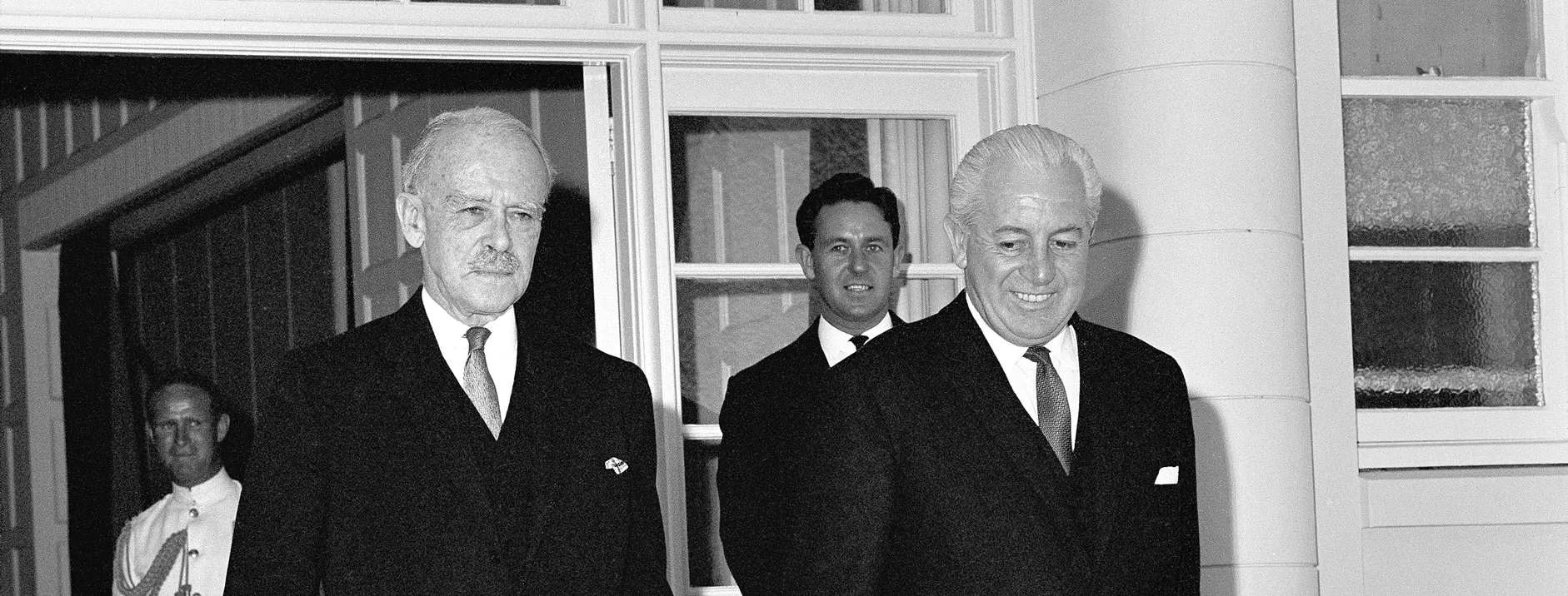 Governor-General Lord Casey and Prime Minister Harold Holt walk out of Government House in Canberra.
