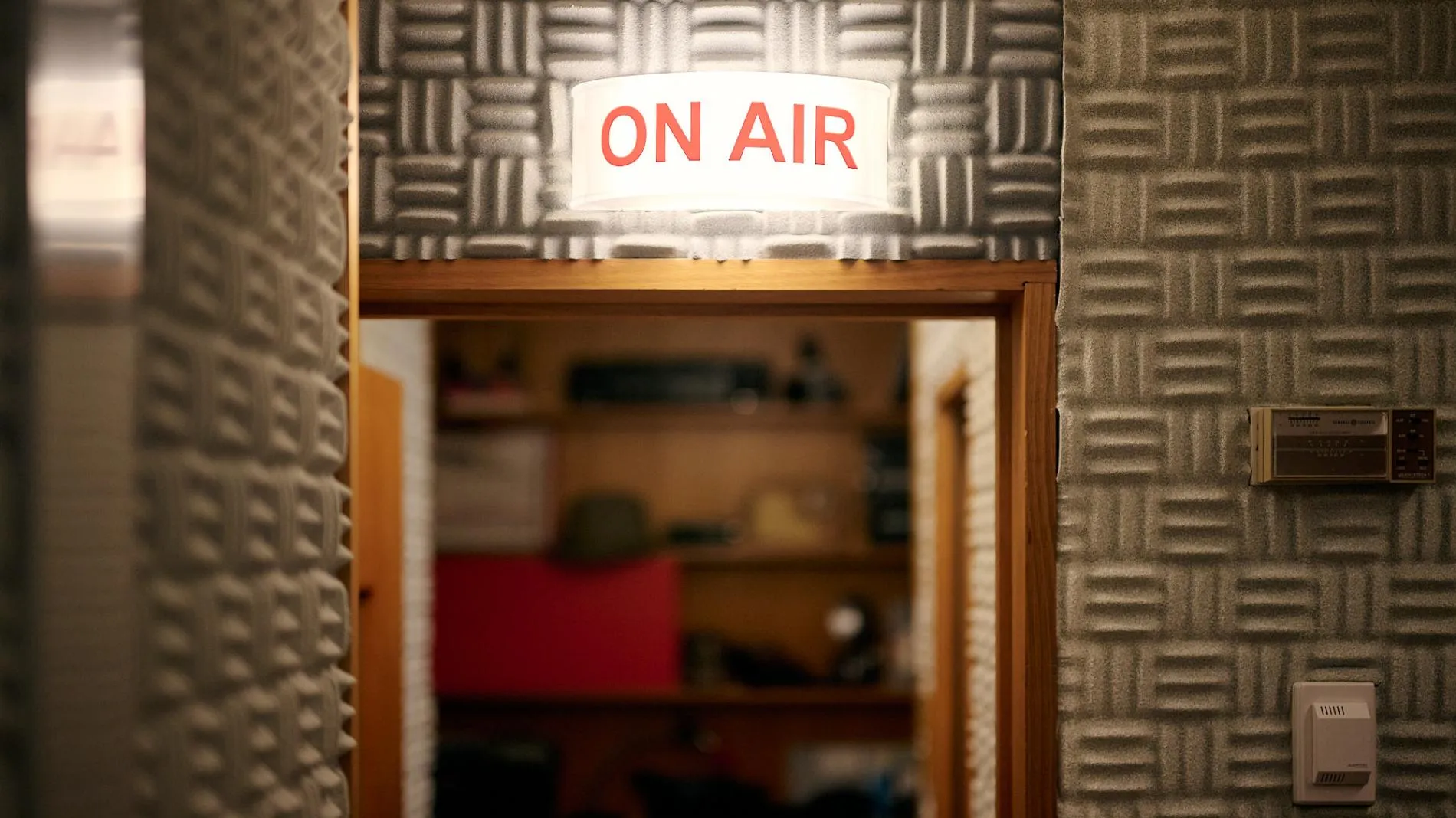 An 'on air' sign is lit up in a studio in the Press Gallery in Old Parliament House.