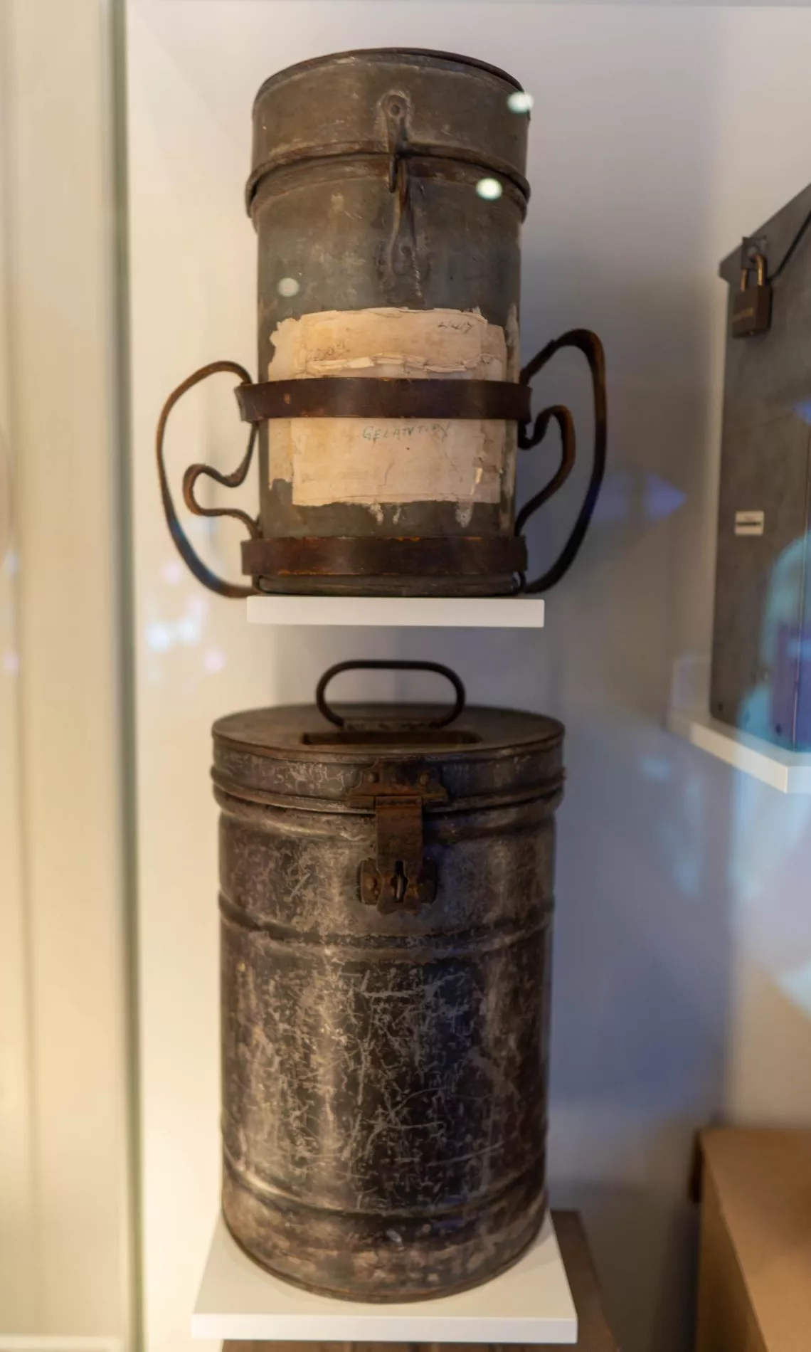 Two old and worn looking circular ballot boxes Two old and worn looking circular ballot boxes