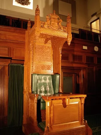 The glowing Speaker’s Chair in the House of Representatives Chamber today. The functional desk was added soon after the unveiling. The glowing Speaker’s Chair in the House of Representatives Chamber today. The functional desk was added soon after the unveiling.