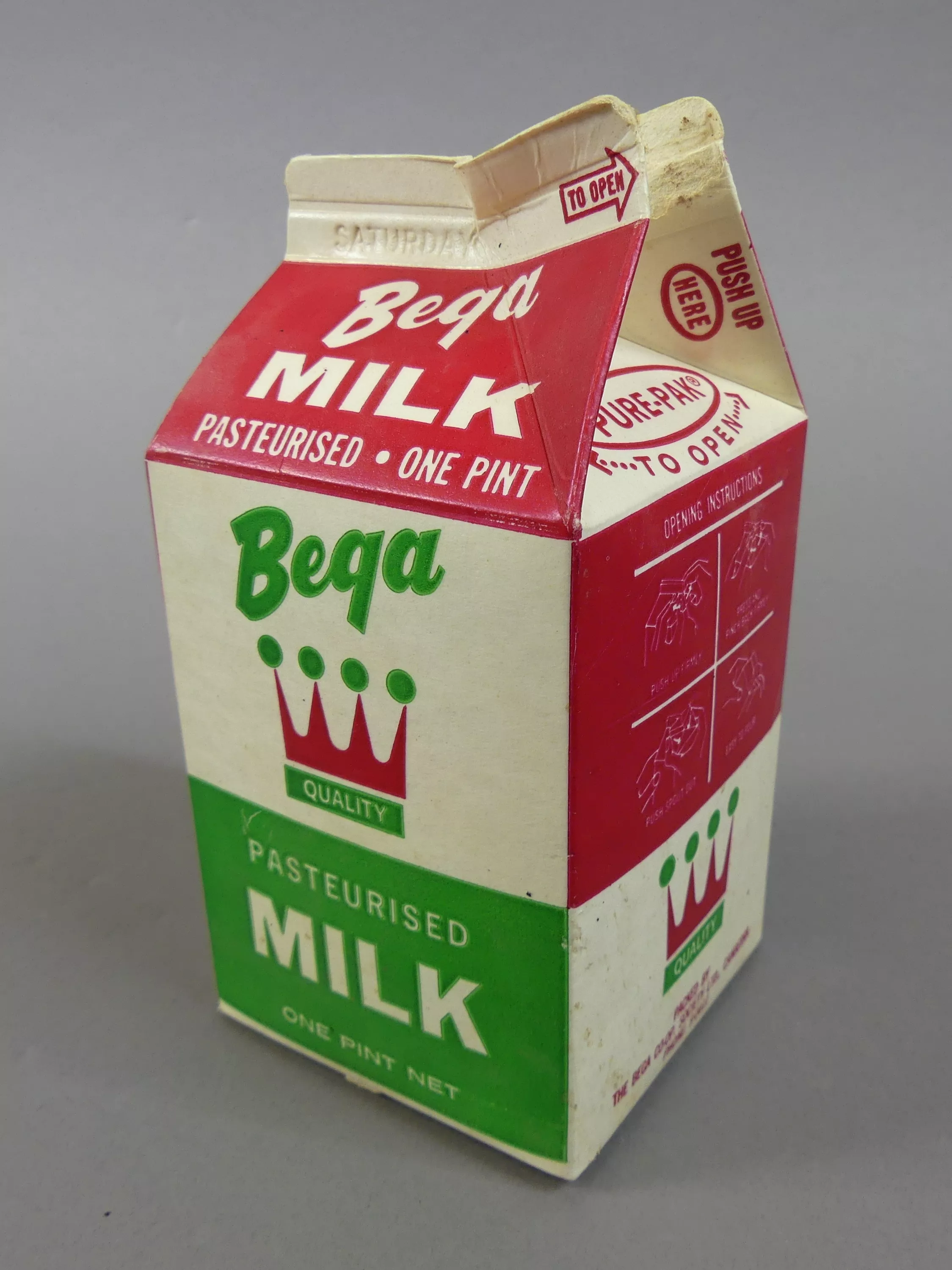 A small open carton of Bega milk A small open carton of Bega milk