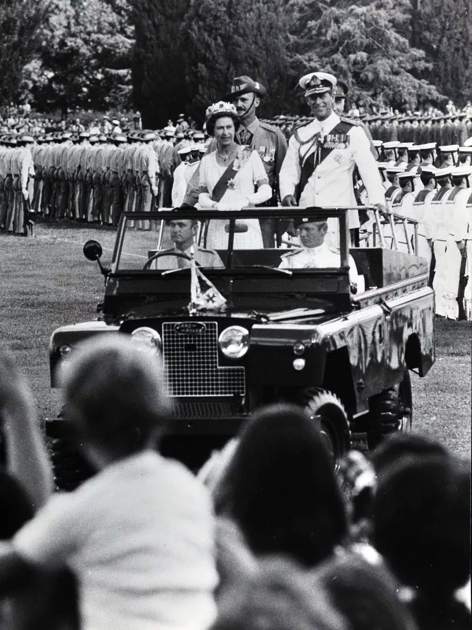 The Queen and Prince Philip review the defence forces and acknowledge the crowds in front of Parliament House The Queen and Prince Philip review the defence forces and acknowledge the crowds in front of Parliament House