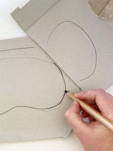 Cardboard with the shape of a koala mask outline. Cardboard with the shape of a koala mask outline.