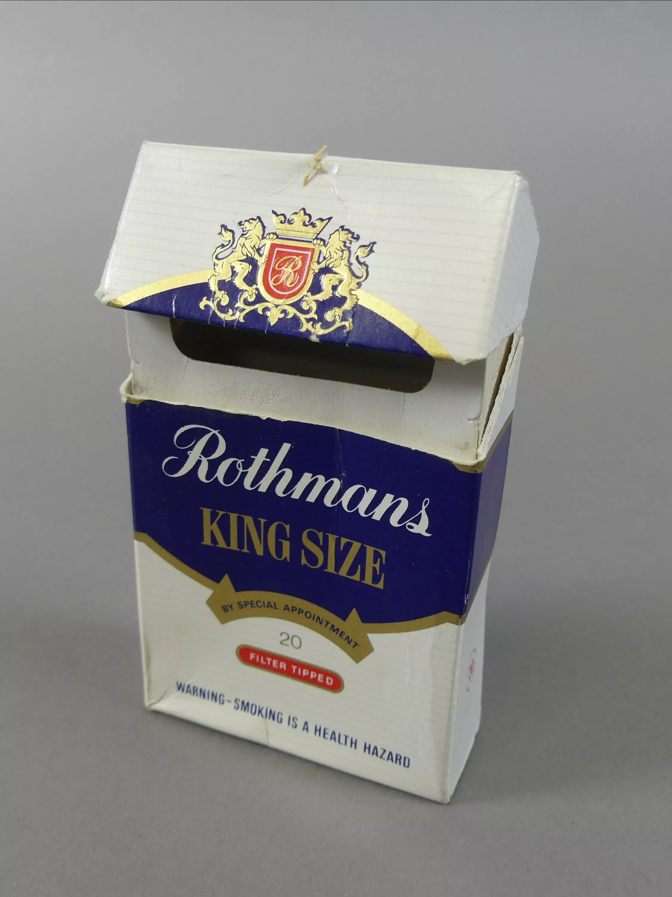 An open packet of Rothmans kingsize ciggarettes An open packet of Rothmans kingsize ciggarettes