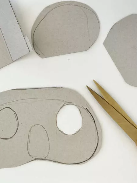 A koala mask with an eye hole cut out. A koala mask with an eye hole cut out.