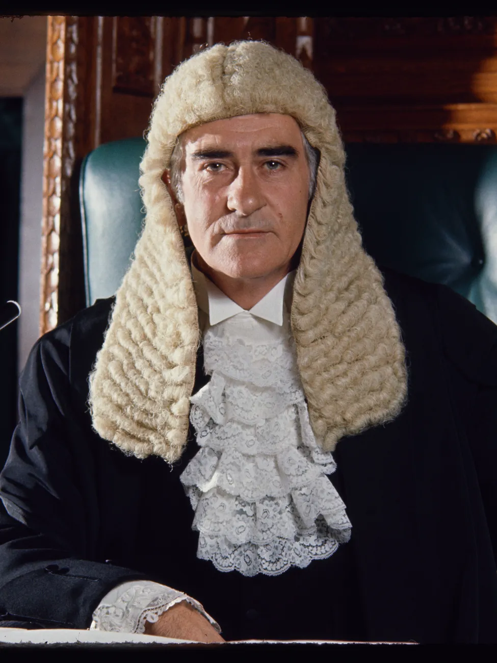 An image of Billy Snedden wearing the wig that was worn by the Speaker of the House of Represenatives.