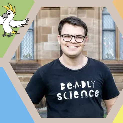 Colourful hexagons surrounding a man smiling and wearing a black t-shirt with the words 'Deadly Science'.