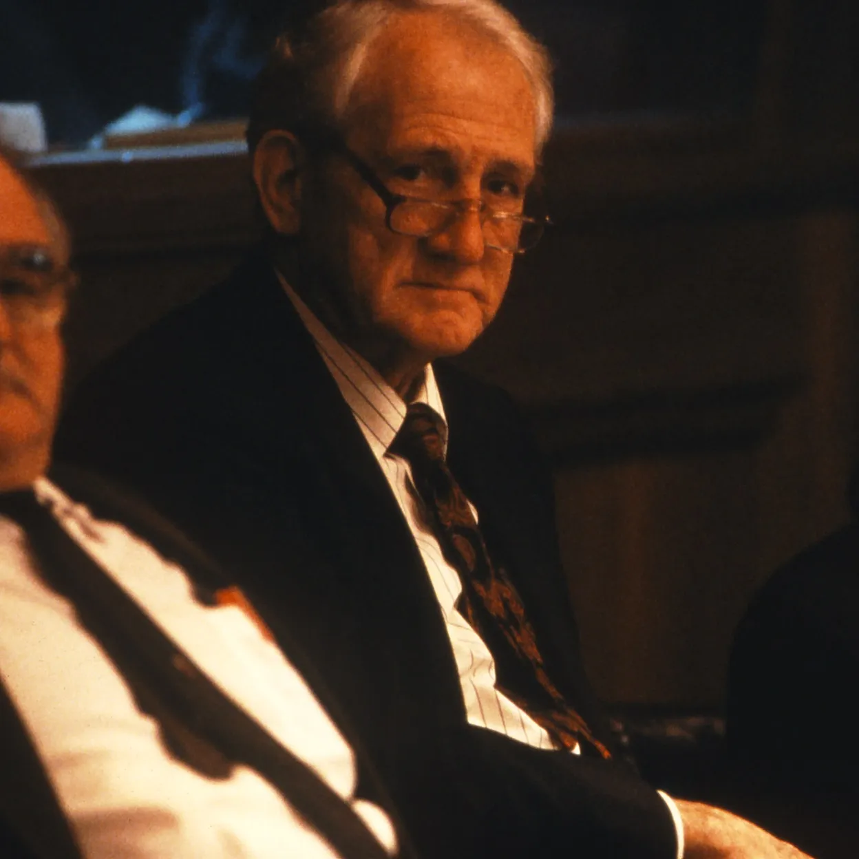 Tom Uren and Jeanette McHugh sitting in the House of Representatives Chamber.